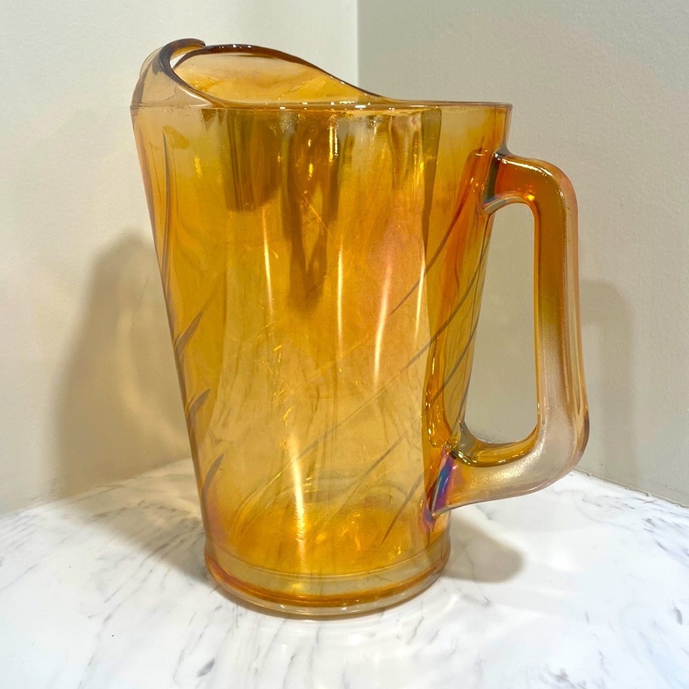 Vintage marigold carnival glass pitcher 
Beautiful condition!